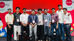 Group photo at Huddle Global panel stage